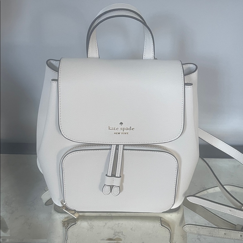 NWT Kate Spade New York Kristi Medium Flap 
Backpack in Merengue Color